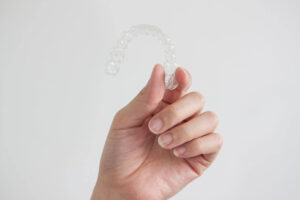 a clear tray that will help with the positive effects and benefits of Invisalign®