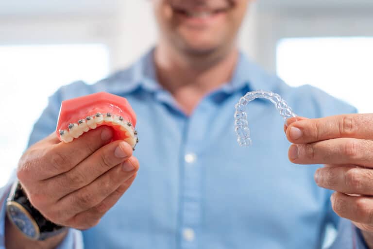 bigstock Dental Care smiling Dentist Do 401824916 2 768x513
